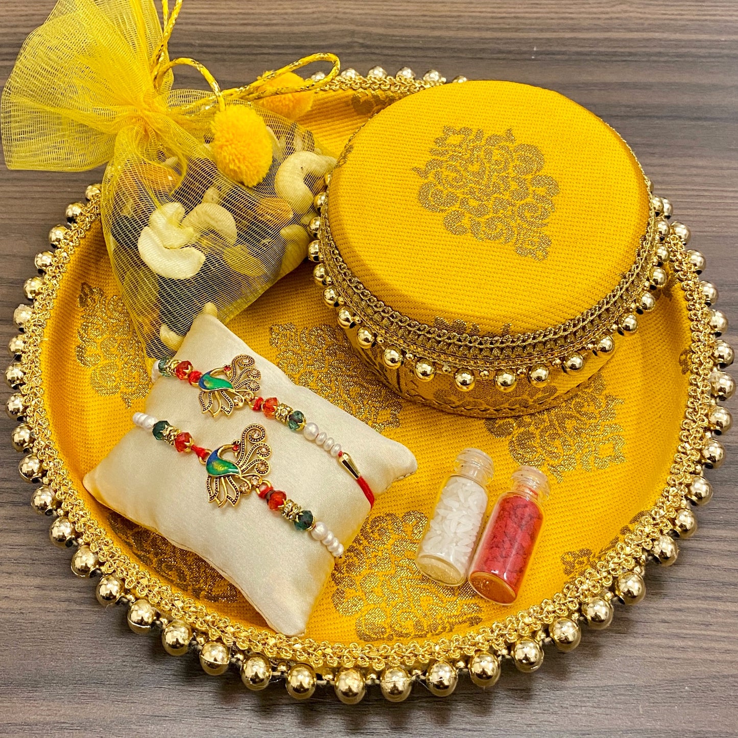 Yellow Rakhi Platter by Saptrishi