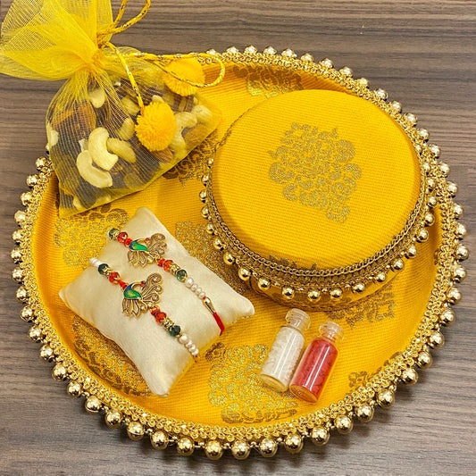 Yellow Rakhi Platter by Saptrishi