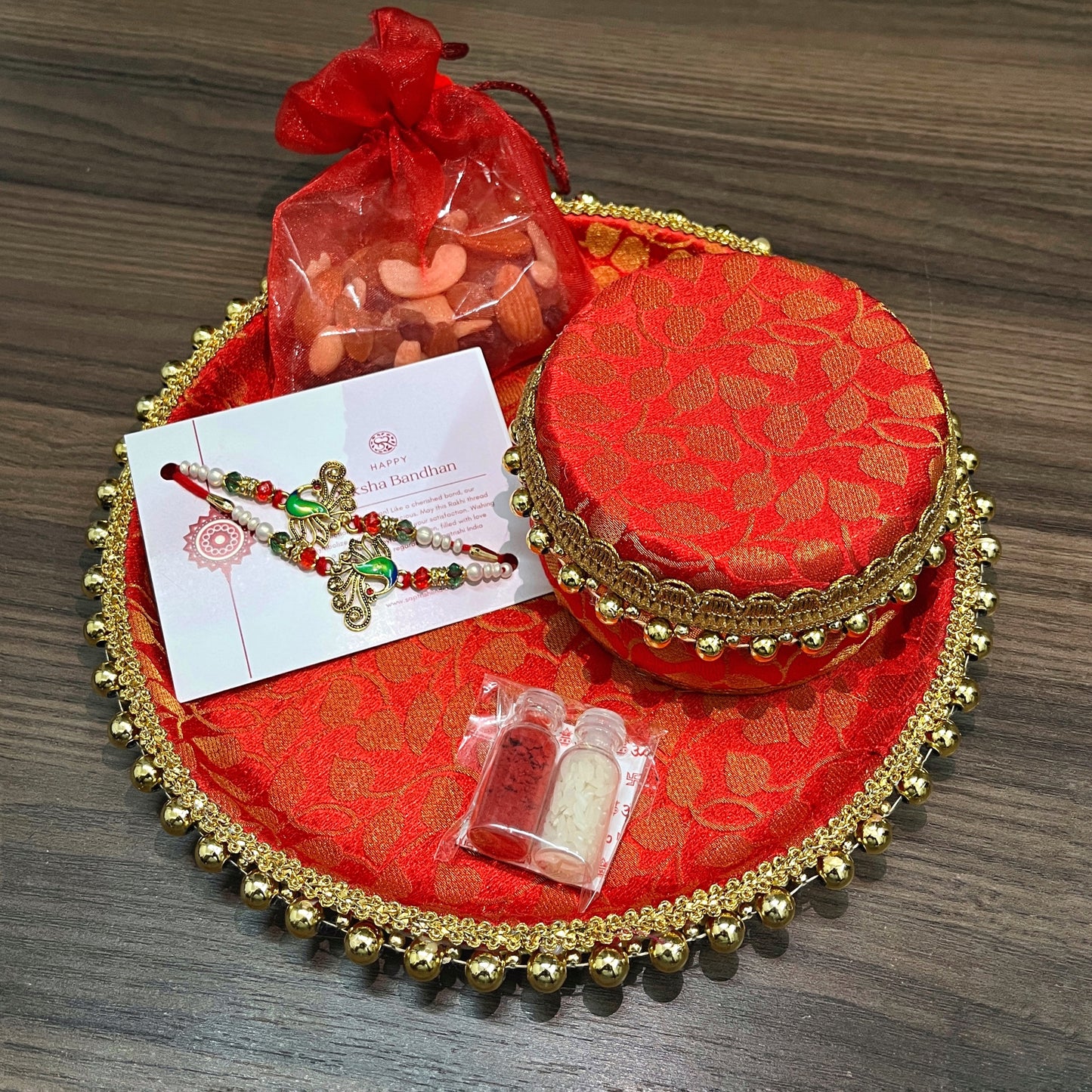 Red Rakhi Platter by Saptarishi