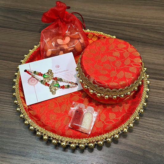 Red Rakhi Platter by Saptarishi