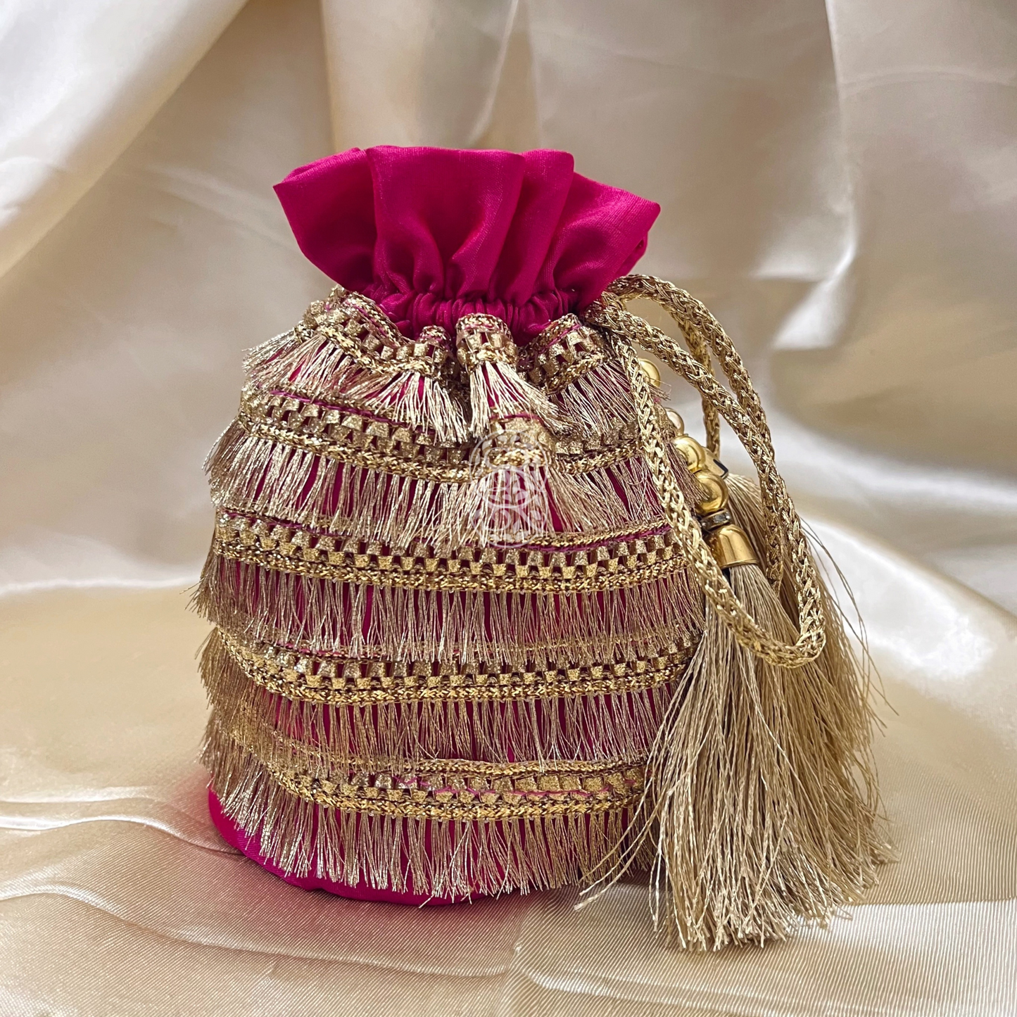 Rani Pink & Gold Fringe Potli Bag by Saptrishi (2pc)